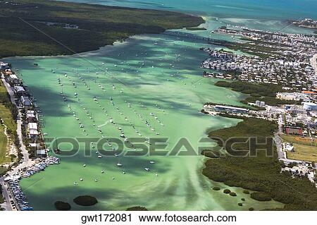 Aerial view of tourist resorts along the sea, Florida Keys, Florida, USA View Large Photo Image Stock Image - Aerial view of tourist resorts along the sea, Florida Keys, Florida, USA. Fotosearch