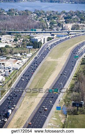 Picture - Aerial view of vehicles moving on multiple lane highways, Interstate 4, Orlando, Florida, USA. Fotosearch