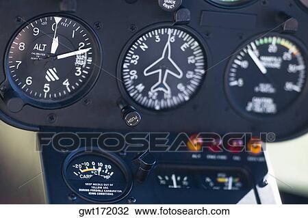Stock Image - Close-up of dial gauges of an airplane. Fotosearch