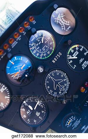 Close-up of dial gauges of an airplane View Large Photo Image Stock Photo - Close-up of dial gauges of an airplane. Fotosearch