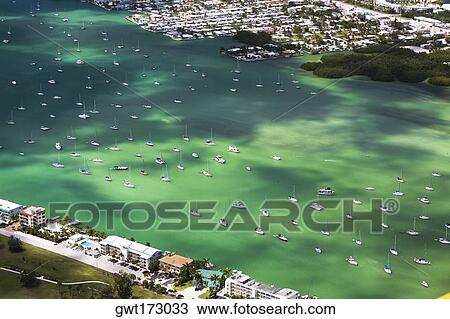 Aerial view of tourist resorts along the sea, Florida Keys, Florida, USA View Large Photo Image Stock Image - Aerial view of tourist resorts along the sea, Florida Keys, Florida, USA. Fotosearch