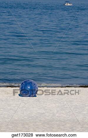 Beach ball on the beach, St. Petersburg, Florida, USA View Large Photo Image Stock Photo - Beach ball on the beach, St. Petersburg, Florida, USA. Fotosearch