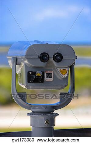 Close-up of a pair of coin-operated binoculars View Large Photo Image Stock Image - Close-up of a pair of coin-operated binoculars. Fotosearch