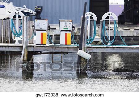 Gas station pumps at a harbor View Large Photo Image Stock Photo - Gas station pumps at a harbor. Fotosearch