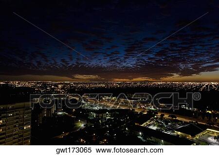Stock Photography - High angle view of a city lit up at night, Miami, Florida, USA. Fotosearch