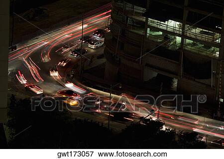 High angle view of traffic moving on the road View Large Photo Image Stock Photo - High angle view of traffic moving on the road. Fotosearch