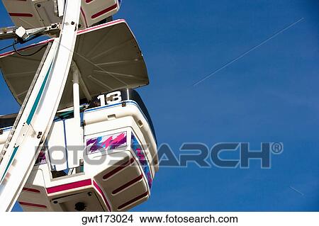 Picture - Low angle view of a ferris wheel, Riverfront Park, Cocoa Village, Cocoa Beach, Florida, USA. Fotosearch