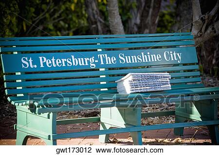 Stack of books on a park bench, St. Petersburg, Florida, USA View Large Photo Image Stock Image - Stack of books on a park bench, St. Petersburg, Florida, USA. Fotosearch