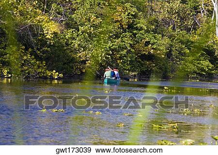 Three people in a rowboat, Fort Lauderdale, Florida, USA View Large Photo Image Stock Photo - Three people in a rowboat, Fort Lauderdale, Florida, USA. Fotosearch