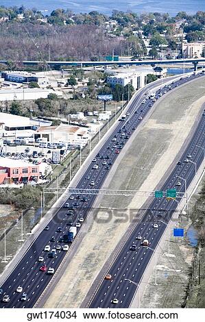 Aerial view of vehicles moving on multiple lane highways, Interstate 4, Orlando, Florida, USA View Large Photo Image Picture - Aerial view of vehicles moving on multiple lane highways, Interstate 4, Orlando, Florida, USA. Fotosearch