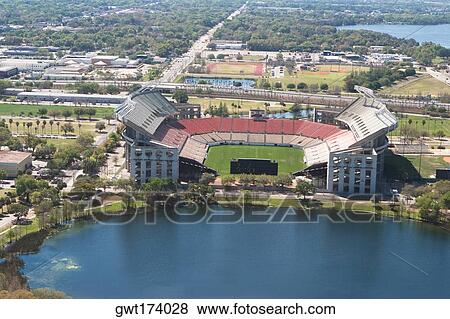 Lake in front of a stadium, Orlando, Florida, USA View Large Photo Image Stock Photo - Lake in front of a stadium, Orlando, Florida, USA. Fotosearch