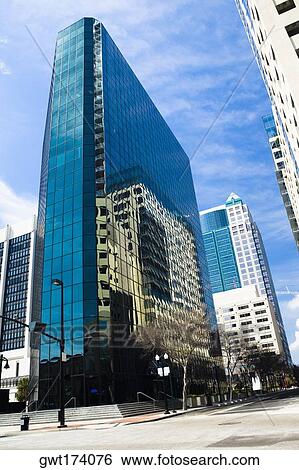 Low angle view of skyscrapers in a city, Orlando, Florida, USA View Large Photo Image Stock Photograph - Low angle view of skyscrapers in a city, Orlando, Florida, USA. Fotosearch