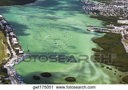 Aerial view of tourist resorts along the sea, Florida Keys, Florida, USA View Large Photo Image Stock Image - Aerial view of tourist resorts along the sea, Florida Keys, Florida, USA. Fotosearch