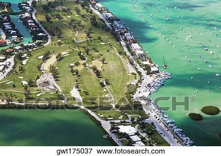 Aerial view of tourist resorts along the sea, Florida Keys, Florida, USA View Large Photo Image Stock Photo - Aerial view of tourist resorts along the sea, Florida Keys, Florida, USA. Fotosearch