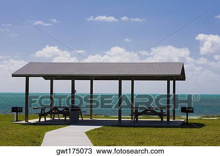 Stock Image - Shade on the beach, Curry Hammock State Park, Marathon, Florida, USA. Fotosearch