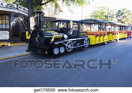 Tourist train on the road, Key West, Florida, USA View Large Photo Image Stock Image - Tourist train on the road, Key West, Florida, USA. Fotosearch