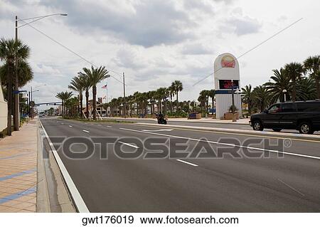 Car moving on the road, Daytona Beach, Florida, USA View Large Photo Image Stock Photo - Car moving on the road, Daytona Beach, Florida, USA. Fotosearch