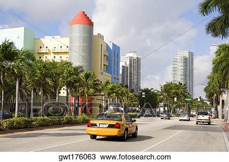 Cars on the road with buildings in the background, South Beach, Miami Beach, Florida, USA View Large Photo Image Stock Image - Cars on the road with buildings in the background, South Beach, Miami Beach, Florida, USA. Fotosearch