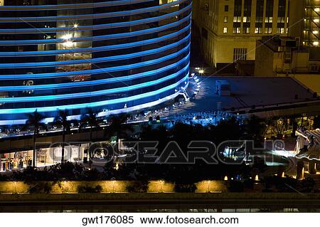 Stock Photography - High angle view of buildings lit up at night. Fotosearch
