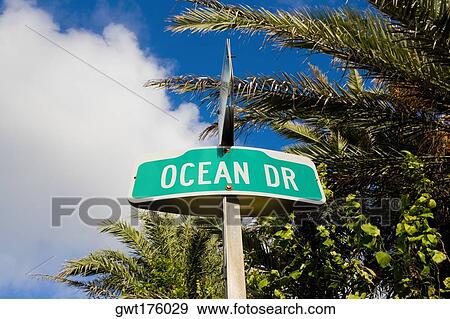 Low angle view of a signboard, South Beach, Miami Beach, Florida, USA View Large Photo Image Stock Photo - Low angle view of a signboard, South Beach, Miami Beach, Florida, USA. Fotosearch
