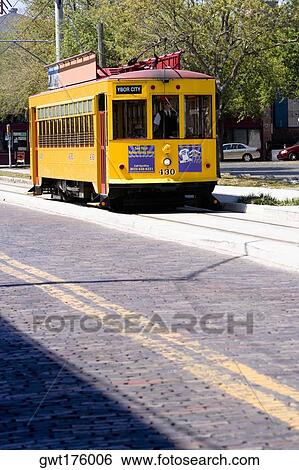 Tram moving in a city, Ybor City, Tampa, Florida, USA View Large Photo Image Stock Photograph - Tram moving in a city, Ybor City, Tampa, Florida, USA. Fotosearch
