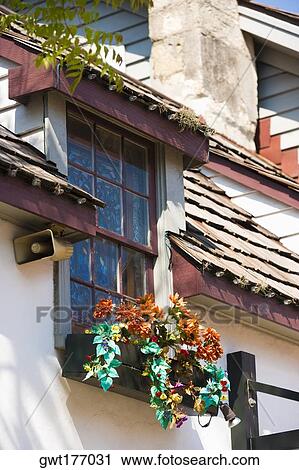 Low angle view of a window box on a building View Large Photo Image Stock Image - Low angle view of a window box on a building. Fotosearch