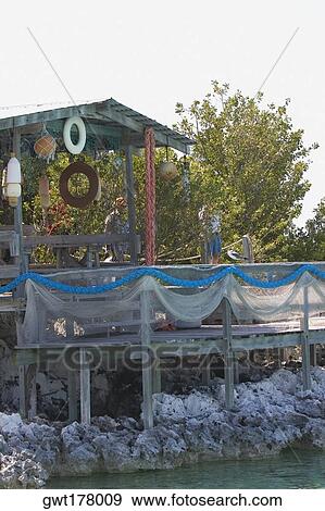 Stock Photo - Beach hut on the coast, Caribbean Sea, Exuma, Bahamas. Fotosearch