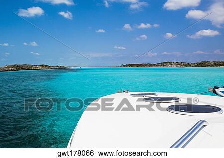 Stock Photograph - Boat in the sea, Exuma, Bahamas. Fotosearch