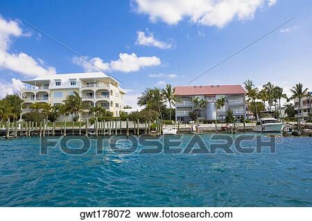 Buildings at the waterfront, Paradise Island, Bahamas View Large Photo Image Stock Image - Buildings at the waterfront, Paradise Island, Bahamas. Fotosearch