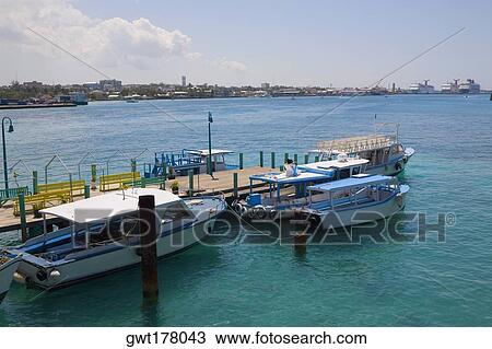 Stock Image - High angle view of boats moored at a pier, Nassau, Bahamas. Fotosearch