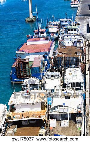 High angle view of cargo containers at a commercial dock, Potter's Cay, Nassau, Bahamas View Large Photo Image Stock Photo - High angle view of cargo containers at a commercial dock, Potter's Cay, Nassau, Bahamas. Fotosearch