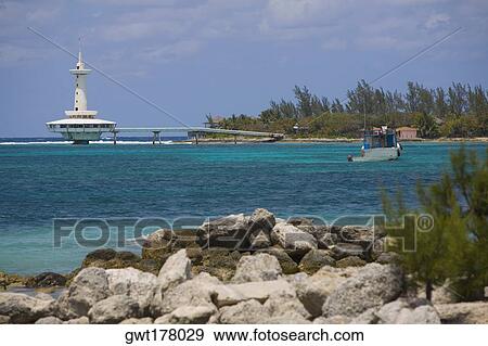 Lighthouse in the sea, Crystal Cay, Nassau, Bahamas View Large Photo Image Stock Photo - Lighthouse in the sea, Crystal Cay, Nassau, Bahamas. Fotosearch
