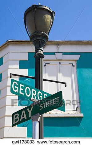 Low angle view of an information board, Bay Street, Nassau, Bahamas View Large Photo Image Stock Image - Low angle view of an information board, Bay Street, Nassau, Bahamas. Fotosearch