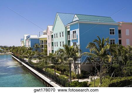 Row houses at a river side, Paradise Island, Bahamas View Large Photo Image Stock Image - Row houses at a river side, Paradise Island, Bahamas. Fotosearch