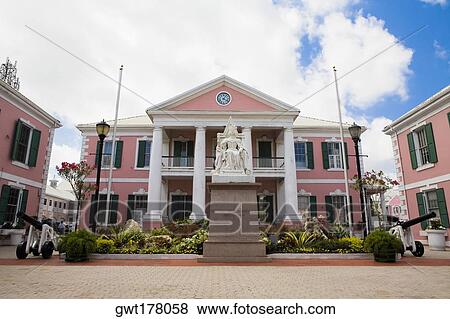 Statue on a pedestal in front of a government building, Parliament, Nassau, Bahamas View Large Photo Image Stock Photo - Statue on a pedestal in front of a government building, Parliament, Nassau, Bahamas. Fotosearch