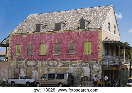 Two vehicles parked beside a house, Bay Street, Nassau, Bahamas View Large Photo Image Stock Photo - Two vehicles parked beside a house, Bay Street, Nassau, Bahamas. Fotosearch