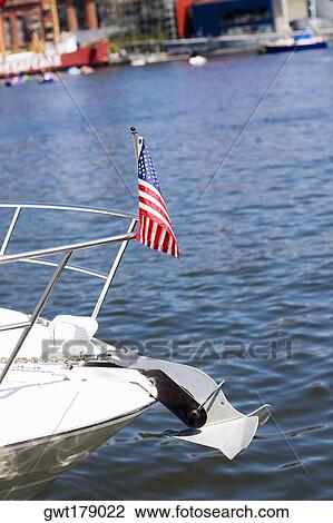American flag on a ship's bow, Baltimore, Maryland, USA View Large Photo Image Stock Image - American flag on a ship's bow, Baltimore, Maryland, USA. Fotosearch