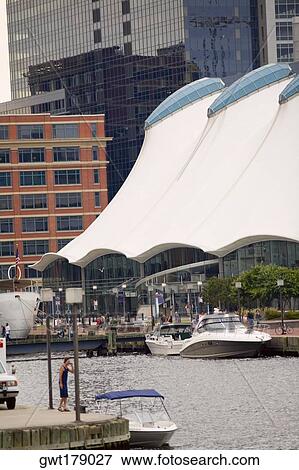 Boats docked at a harbor, Columbus Center, Inner Harbor, Baltimore, Maryland, USA View Large Photo Image Stock Photo - Boats docked at a harbor, Columbus Center, Inner Harbor, Baltimore, Maryland, USA. Fotosearch