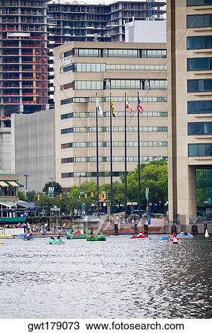 Stock Image - Buildings at the waterfront, Inner Harbor, Baltimore, Maryland, USA. Fotosearch