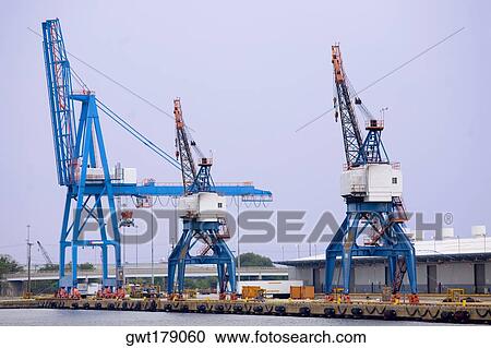 Cranes at a commercial dock, Baltimore, Maryland, USA View Large Photo Image Stock Image - Cranes at a commercial dock, Baltimore, Maryland, USA. Fotosearch