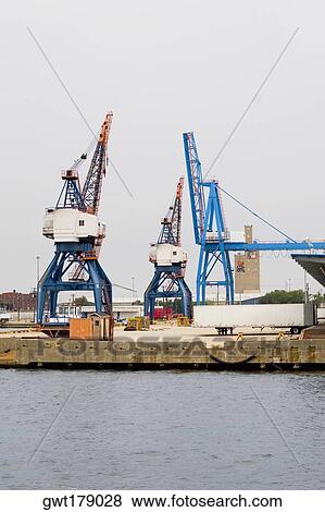 Cranes at a commercial dock, Baltimore, Maryland, USA View Large Photo Image Stock Photo - Cranes at a commercial dock, Baltimore, Maryland, USA. Fotosearch