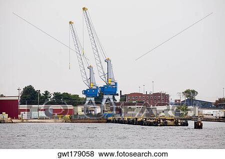 Cranes at a commercial dock, Baltimore, Maryland, USA View Large Photo Image Stock Photo - Cranes at a commercial dock, Baltimore, Maryland, USA. Fotosearch