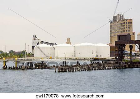 Storage tanks at a harbor, Inner Harbor, Baltimore, Maryland, USA View Large Photo Image Stock Photo - Storage tanks at a harbor, Inner Harbor, Baltimore, Maryland, USA. Fotosearch