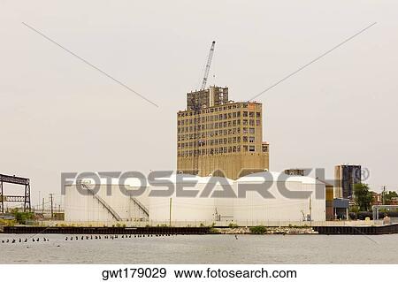 Storage tanks at the waterfront, Baltimore, Maryland, USA View Large Photo Image Stock Photo - Storage tanks at the waterfront, Baltimore, Maryland, USA. Fotosearch