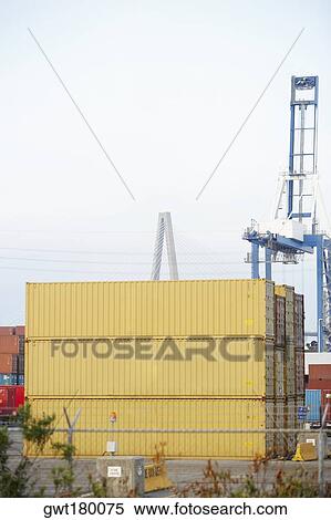 Cargo containers and a crane at a commercial dock, Charleston, South Carolina, USA View Large Photo Image Stock Photography - Cargo containers and a crane at a commercial dock, Charleston, South Carolina, USA. Fotosearch