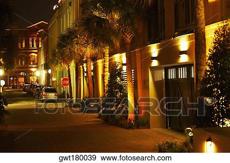 Cars parked in a row at night, Charleston, South Carolina, USA View Large Photo Image Stock Photo - Cars parked in a row at night, Charleston, South Carolina, USA. Fotosearch