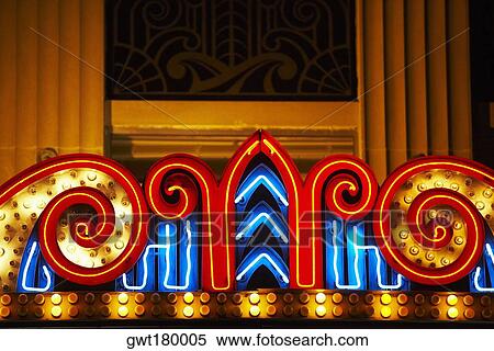 Stock Photography - Close-up of a theater marquee lit up at night, Charleston, South Carolina, USA. Fotosearch