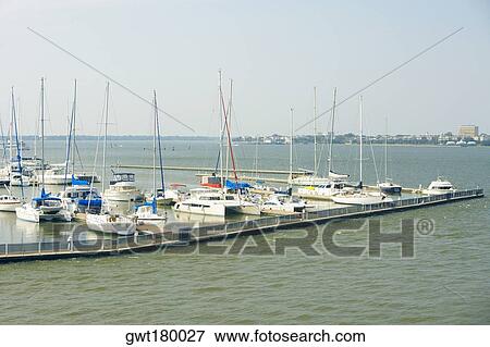 High angle view of sailboats docked at a harbor, Patriot's Point, Charleston Harbor, Charleston, South Carolina, USA View Large Photo Image Stock Photo - High angle view of sailboats docked at a harbor, Patriot's Point, Charleston Harbor, Charleston, South Carolina, USA. Fotosearch