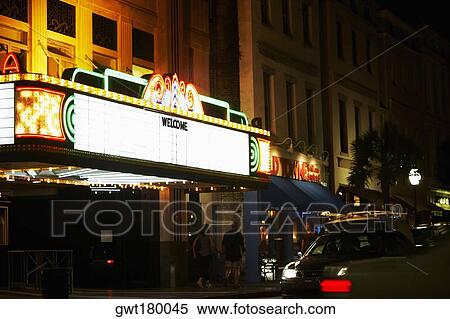 Rear view of a man and a woman walking in front of a building, Charleston, South Carolina, USA View Large Photo Image Stock Photography - Rear view of a man and a woman walking in front of a building, Charleston, South Carolina, USA. Fotosearch