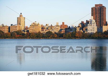 Buildings at the waterfront, Central Park, Manhattan, New York City, New York State, USA View Large Photo Image Stock Image - Buildings at the waterfront, Central Park, Manhattan, New York City, New York State, USA. Fotosearch